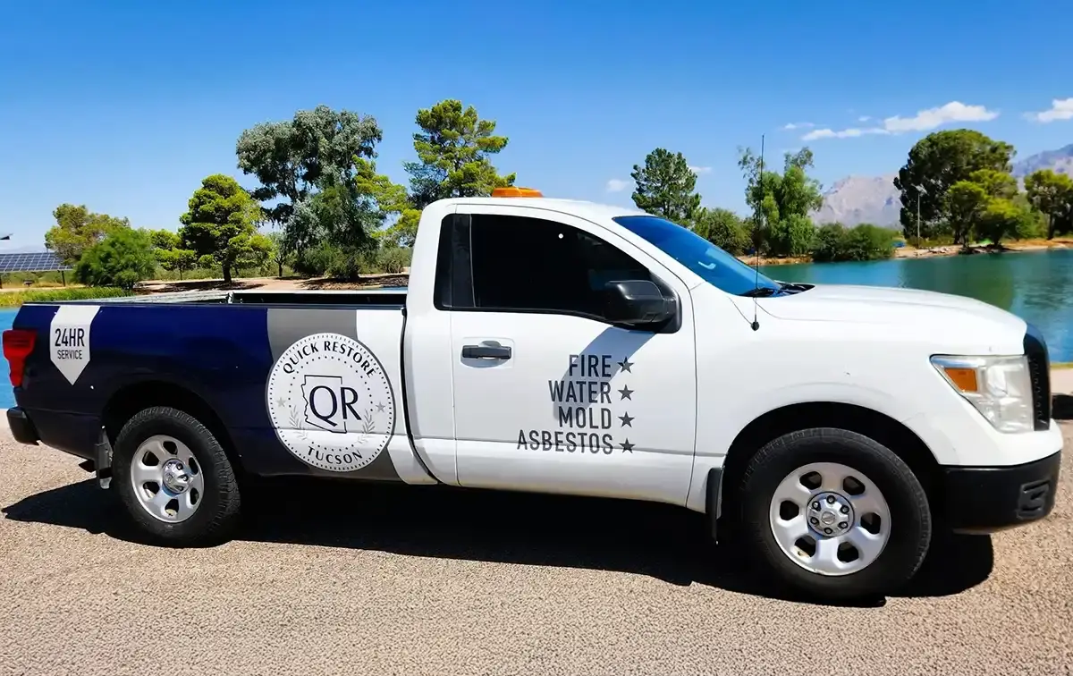 Parked truck with Quick Restore company branding